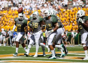 Baylor Bears safety Orion Stewart (28) celebrates after an interception against the SMU Mustangs at McLane Stadium in Waco, Texas.