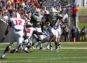 Baylor Bears quarterback Seth Russell (17) scrambles out of the pocket against the SMU Mustangs during the third quarter at McLane Stadium in Waco, Texas.
