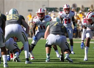 SMU Mustangs linebacker Kyran Mitchell (11) eyes the Baylor Bears backfield pre-snap at McLane Stadium in Waco, Texas.