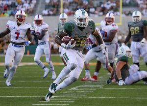 Baylor Bears running back Terence Williams (22) breaks into the SMU Mustangs secondary and jukes a defender during the second half at McLane Stadium in Waco, Texas.