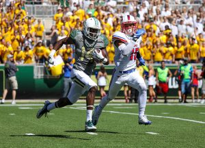 Baylor Bears wide receiver Chris Platt (14) pulls away from SMU Mustangs defensive back Jordan Wyatt (15) during the second quarter at McLane Stadium in Waco, Texas.